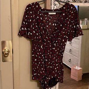 Maroon romper with tie around waste